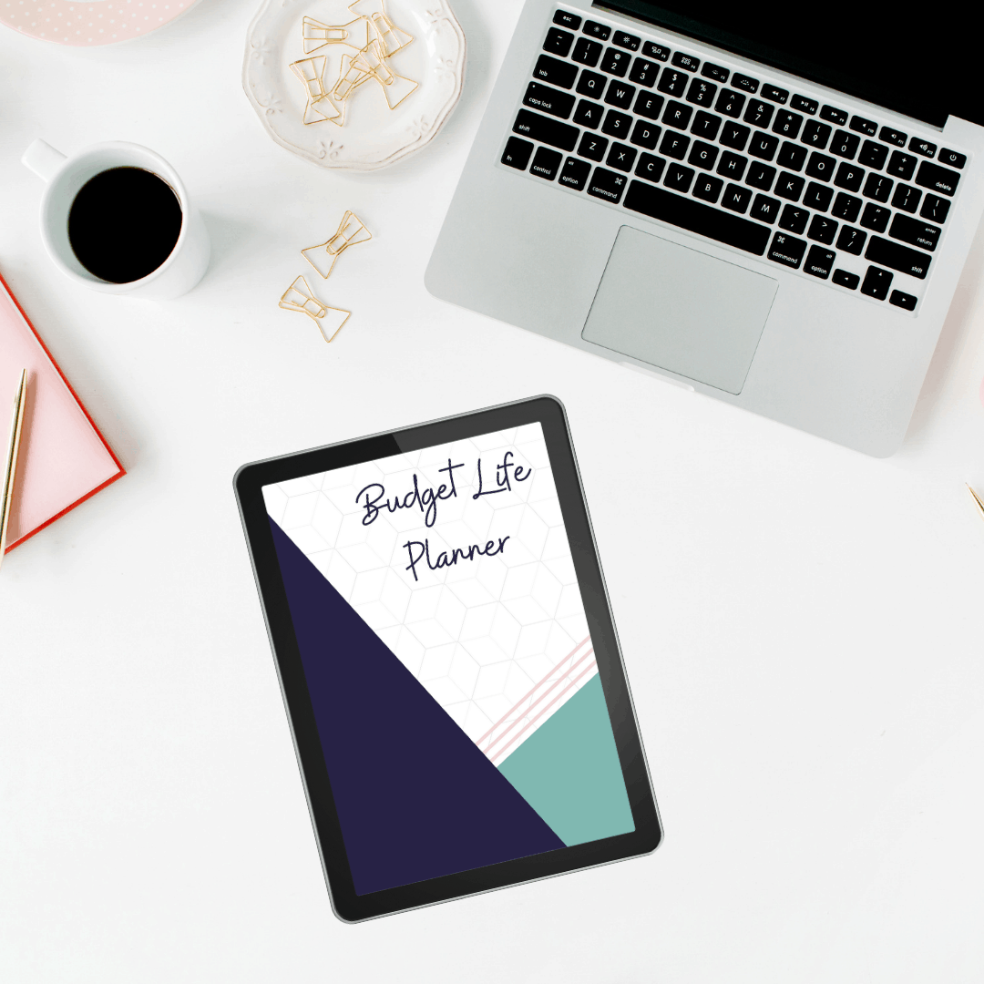 Modern family budgeting setup with laptop and planner